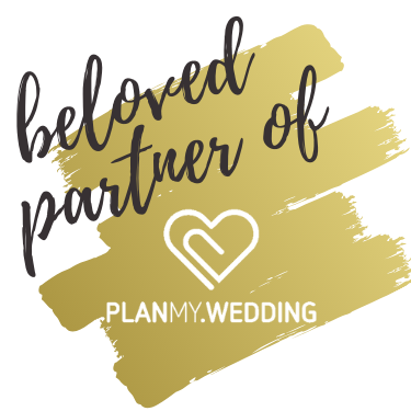 beloved partner 375x375 - Reinweiss Hochzeiten Text in elegant font: "beloved partner of" above a golden brushstroke, below that the logo of PlanMy.Wedding.